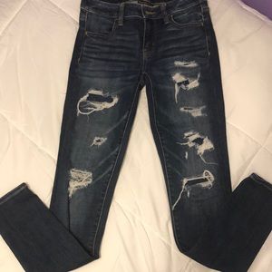Dark blue denim ripped jeans